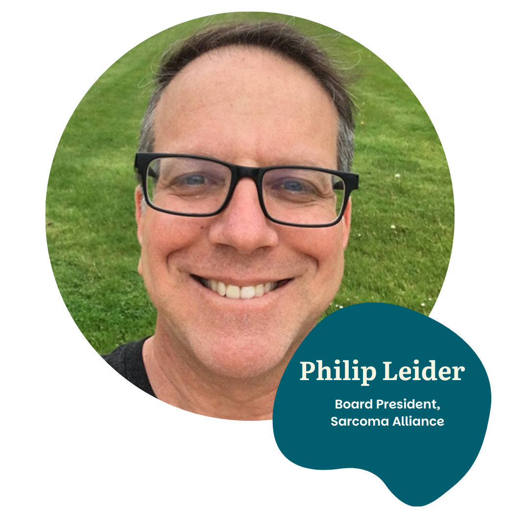 A smiling man with short hair and glasses stands on a grassy lawn. Text on a blue shape reads: "Philip Leider, Board President, Sarcoma Alliance.